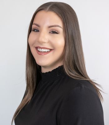 Portrait of Briana Karim, Realtor.